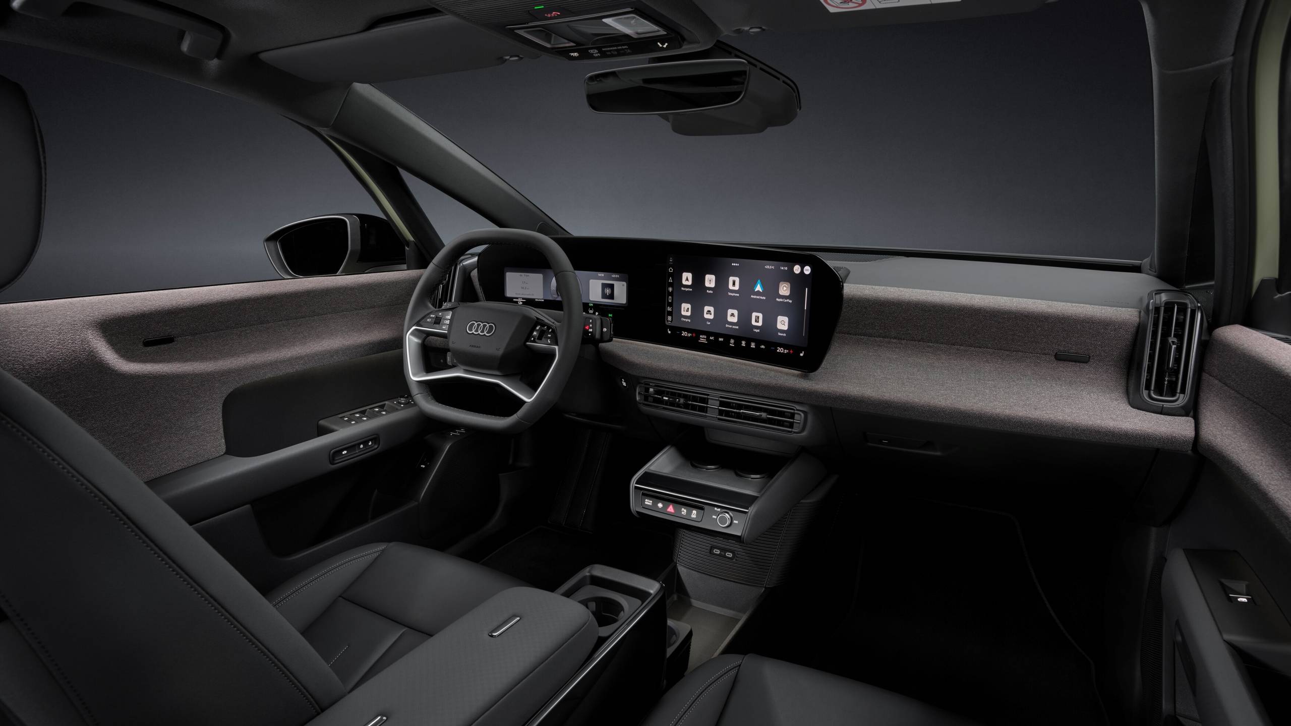Interior do Audi A2 e-tron com ecrã panorâmico MMI